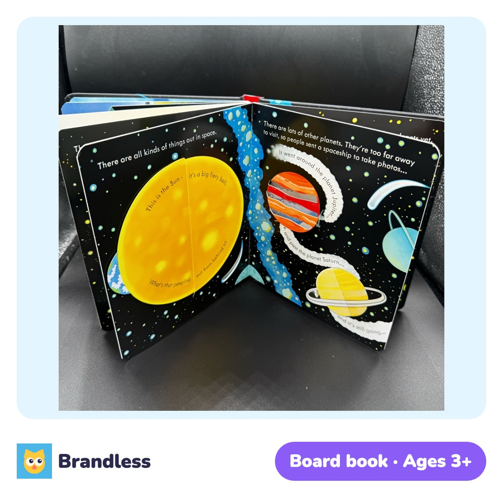 Space rocket pop-up and lift-the-flap cardboard book opened to a pop-up scene